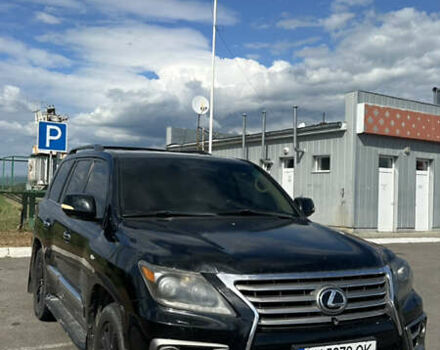 Черный Лексус ЛХ, объемом двигателя 5.66 л и пробегом 320 тыс. км за 33000 $, фото 1 на Automoto.ua