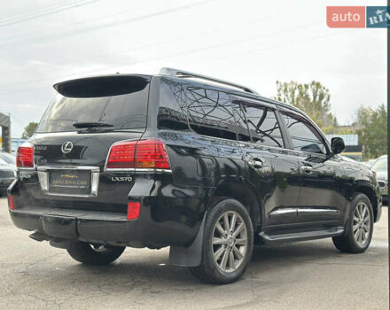 Черный Лексус ЛХ, объемом двигателя 5.69 л и пробегом 299 тыс. км за 26800 $, фото 9 на Automoto.ua