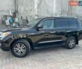 Черный Лексус ЛХ, объемом двигателя 5.66 л и пробегом 645 тыс. км за 17500 $, фото 1 на Automoto.ua