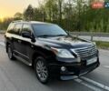 Черный Лексус ЛХ, объемом двигателя 5.66 л и пробегом 242 тыс. км за 28800 $, фото 1 на Automoto.ua