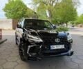 Черный Лексус ЛХ, объемом двигателя 5.66 л и пробегом 265 тыс. км за 38500 $, фото 1 на Automoto.ua