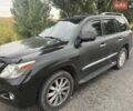 Чорний Лексус ЛХ, об'ємом двигуна 5.7 л та пробігом 350 тис. км за 25021 $, фото 1 на Automoto.ua