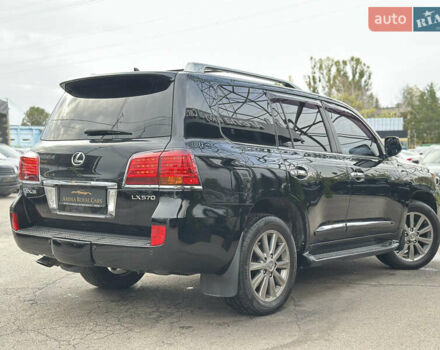 Черный Лексус ЛХ, объемом двигателя 5.69 л и пробегом 299 тыс. км за 26800 $, фото 1 на Automoto.ua