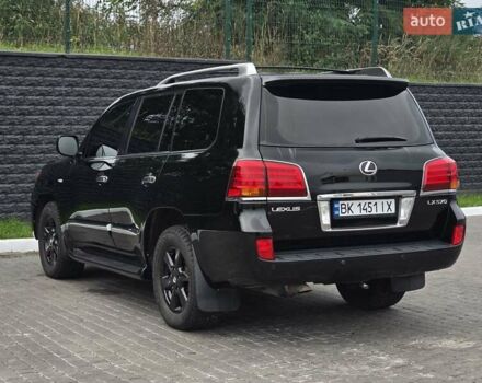 Черный Лексус ЛХ, объемом двигателя 5.66 л и пробегом 238 тыс. км за 25700 $, фото 2 на Automoto.ua