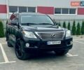 Черный Лексус ЛХ, объемом двигателя 5.66 л и пробегом 248 тыс. км за 32700 $, фото 1 на Automoto.ua