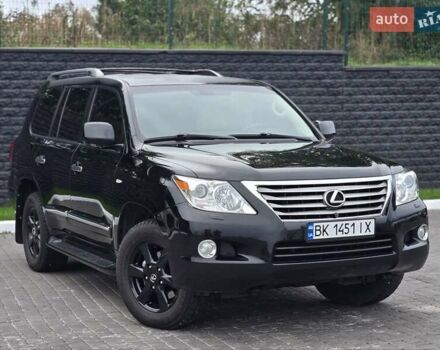 Черный Лексус ЛХ, объемом двигателя 5.66 л и пробегом 238 тыс. км за 25700 $, фото 1 на Automoto.ua
