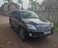 Черный Лексус ЛХ, объемом двигателя 5.66 л и пробегом 220 тыс. км за 29500 $, фото 1 на Automoto.ua