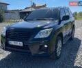 Черный Лексус ЛХ, объемом двигателя 5.66 л и пробегом 178 тыс. км за 28000 $, фото 1 на Automoto.ua