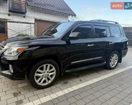 Черный Лексус ЛХ, объемом двигателя 5.66 л и пробегом 288 тыс. км за 29300 $, фото 3 на Automoto.ua