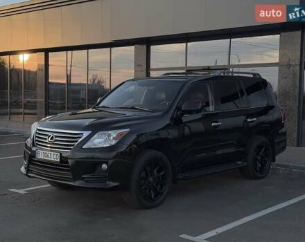 Черный Лексус ЛХ, объемом двигателя 5.66 л и пробегом 246 тыс. км за 31000 $, фото 1 на Automoto.ua