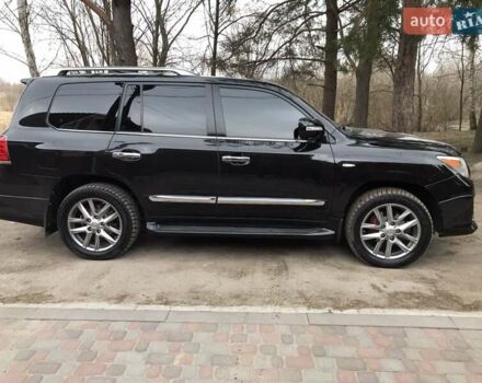 Черный Лексус ЛХ, объемом двигателя 5.7 л и пробегом 197 тыс. км за 39000 $, фото 1 на Automoto.ua