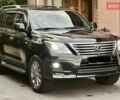 Черный Лексус ЛХ, объемом двигателя 5.7 л и пробегом 286 тыс. км за 37000 $, фото 1 на Automoto.ua