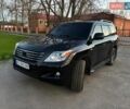 Черный Лексус ЛХ, объемом двигателя 5.66 л и пробегом 165 тыс. км за 31500 $, фото 1 на Automoto.ua