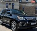 Черный Лексус ЛХ, объемом двигателя 5.66 л и пробегом 252 тыс. км за 38000 $, фото 1 на Automoto.ua