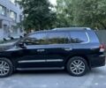 Черный Лексус ЛХ, объемом двигателя 5.7 л и пробегом 231 тыс. км за 31000 $, фото 1 на Automoto.ua