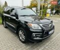 Черный Лексус ЛХ, объемом двигателя 5.66 л и пробегом 200 тыс. км за 40000 $, фото 1 на Automoto.ua