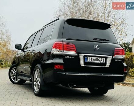 Черный Лексус ЛХ, объемом двигателя 5.66 л и пробегом 176 тыс. км за 35500 $, фото 7 на Automoto.ua