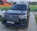 Черный Лексус ЛХ, объемом двигателя 5.7 л и пробегом 170 тыс. км за 45000 $, фото 1 на Automoto.ua