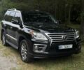 Черный Лексус ЛХ, объемом двигателя 5.7 л и пробегом 220 тыс. км за 35014 $, фото 1 на Automoto.ua