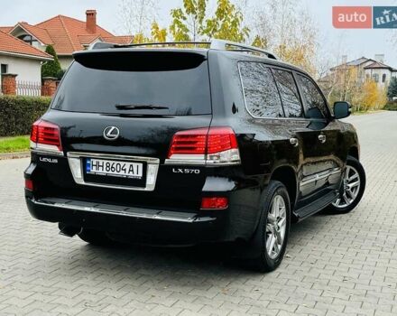 Черный Лексус ЛХ, объемом двигателя 5.66 л и пробегом 176 тыс. км за 35500 $, фото 2 на Automoto.ua