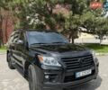 Черный Лексус ЛХ, объемом двигателя 5.7 л и пробегом 182 тыс. км за 33000 $, фото 1 на Automoto.ua
