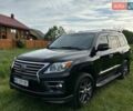 Черный Лексус ЛХ, объемом двигателя 5.7 л и пробегом 185 тыс. км за 39500 $, фото 1 на Automoto.ua
