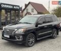 Черный Лексус ЛХ, объемом двигателя 5.66 л и пробегом 225 тыс. км за 39000 $, фото 1 на Automoto.ua