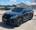 Черный Лексус ЛХ, объемом двигателя 5.66 л и пробегом 332 тыс. км за 37490 $, фото 1 на Automoto.ua