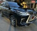 Черный Лексус ЛХ, объемом двигателя 5.66 л и пробегом 294 тыс. км за 59500 $, фото 1 на Automoto.ua