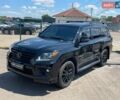 Черный Лексус ЛХ, объемом двигателя 5.66 л и пробегом 332 тыс. км за 45990 $, фото 1 на Automoto.ua