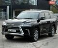 Черный Лексус ЛХ, объемом двигателя 5.66 л и пробегом 279 тыс. км за 55000 $, фото 1 на Automoto.ua