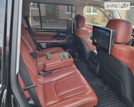 Черный Лексус ЛХ, объемом двигателя 5.66 л и пробегом 156 тыс. км за 67000 $, фото 4 на Automoto.ua