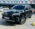 Черный Лексус ЛХ, объемом двигателя 5.66 л и пробегом 174 тыс. км за 57500 $, фото 1 на Automoto.ua
