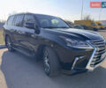 Черный Лексус ЛХ, объемом двигателя 5.66 л и пробегом 206 тыс. км за 68000 $, фото 1 на Automoto.ua