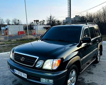 Черный Лексус ЛХ, объемом двигателя 4.7 л и пробегом 256 тыс. км за 12950 $, фото 1 на Automoto.ua