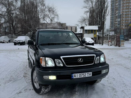Черный Лексус ЛХ, объемом двигателя 4.66 л и пробегом 240 тыс. км за 8500 $, фото 1 на Automoto.ua