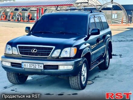 Черный Лексус ЛХ, объемом двигателя 4.7 л и пробегом 250 тыс. км за 8999 $, фото 1 на Automoto.ua