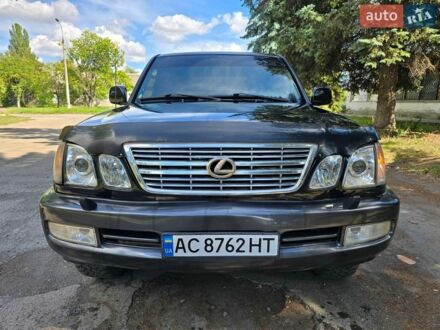 Черный Лексус ЛХ, объемом двигателя 4.7 л и пробегом 290 тыс. км за 11659 $, фото 1 на Automoto.ua