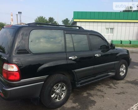 Черный Лексус ЛХ, объемом двигателя 4.7 л и пробегом 315 тыс. км за 15000 $, фото 1 на Automoto.ua