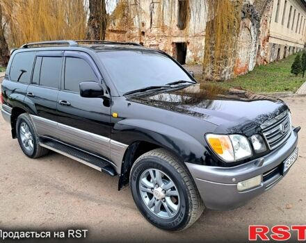 Черный Лексус ЛХ, объемом двигателя 4.7 л и пробегом 297 тыс. км за 18500 $, фото 1 на Automoto.ua