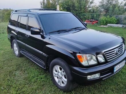 Черный Лексус ЛХ, объемом двигателя 4.7 л и пробегом 430 тыс. км за 13500 $, фото 1 на Automoto.ua