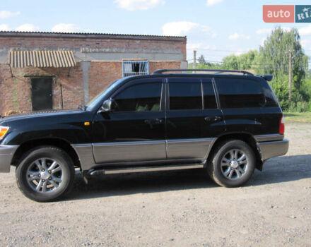 Черный Лексус ЛХ, объемом двигателя 4.67 л и пробегом 286 тыс. км за 12500 $, фото 1 на Automoto.ua