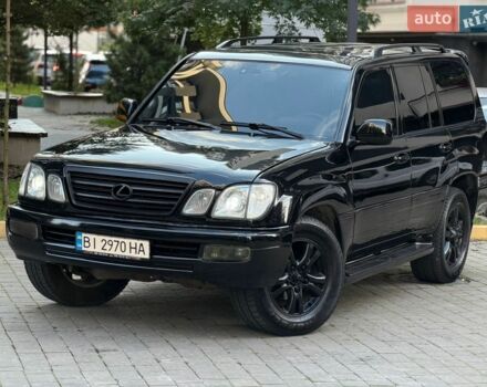Черный Лексус ЛХ, объемом двигателя 4.7 л и пробегом 300 тыс. км за 12800 $, фото 1 на Automoto.ua