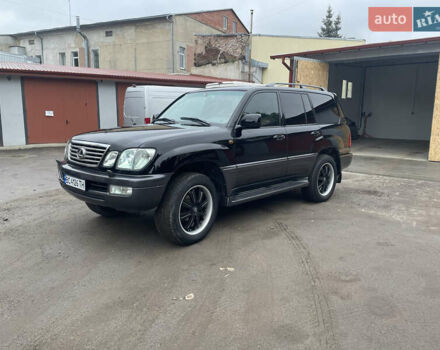 Черный Лексус ЛХ, объемом двигателя 4.66 л и пробегом 312 тыс. км за 16300 $, фото 1 на Automoto.ua