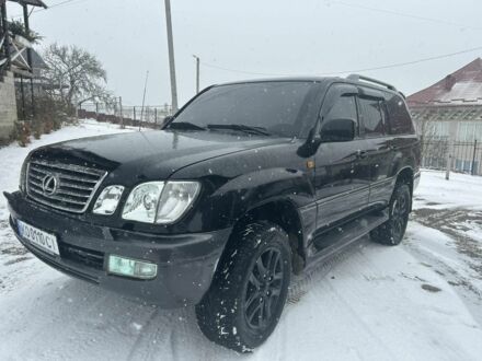 Черный Лексус ЛХ, объемом двигателя 4.7 л и пробегом 298 тыс. км за 14000 $, фото 1 на Automoto.ua