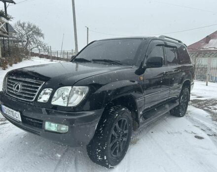 Черный Лексус ЛХ, объемом двигателя 4.7 л и пробегом 298 тыс. км за 14000 $, фото 1 на Automoto.ua