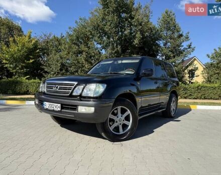 Чорний Лексус ЛХ, об'ємом двигуна 4.66 л та пробігом 380 тис. км за 15500 $, фото 1 на Automoto.ua