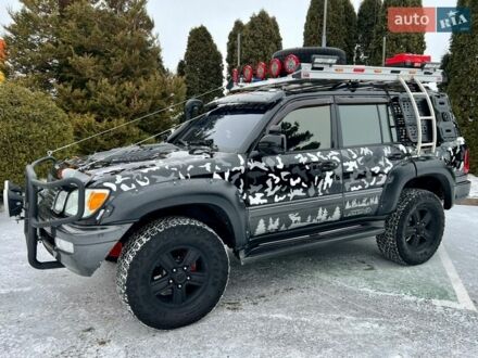 Черный Лексус ЛХ, объемом двигателя 4.7 л и пробегом 260 тыс. км за 30000 $, фото 1 на Automoto.ua