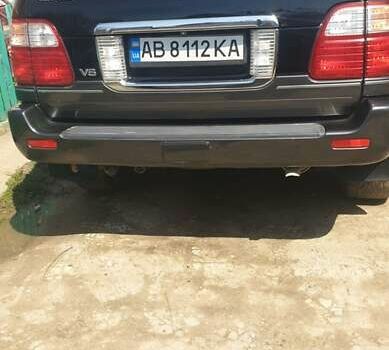 Черный Лексус ЛХ, объемом двигателя 4.66 л и пробегом 300 тыс. км за 13000 $, фото 1 на Automoto.ua