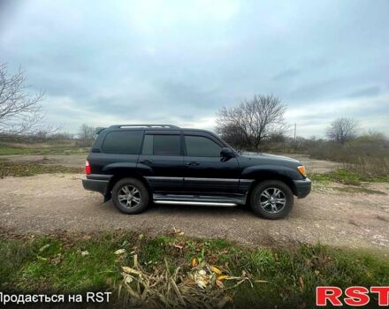 Черный Лексус ЛХ, объемом двигателя 4.7 л и пробегом 282 тыс. км за 14000 $, фото 1 на Automoto.ua